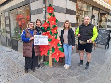 Botiguers del carrer de sa Lluna presentaren la campanya.