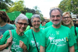 Muriel Casals amb Jaume Mateu, president de l'OCB, a la manifestació contra el TIL a Palma del setembre de l'any 2013.