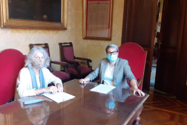 Vivas i Rosselló durant la signatura de l'acord.