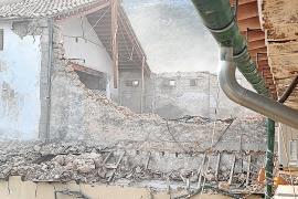 Vista de la paret mitjanera des de casa d’un veïnat.